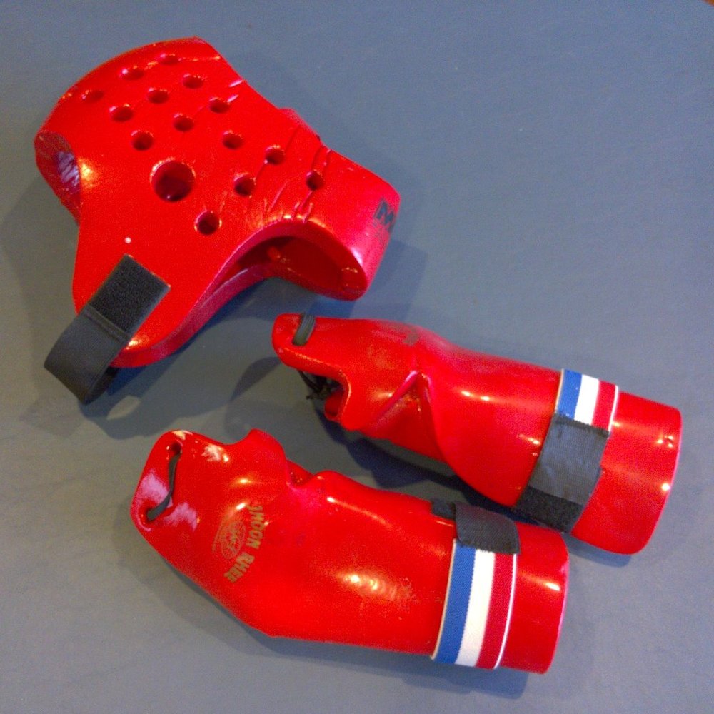 Sparring helmet and a pair of gloves